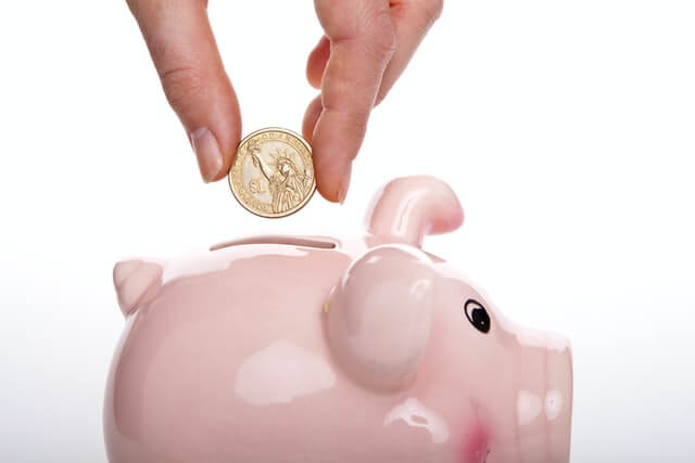 saving money in piggy bank