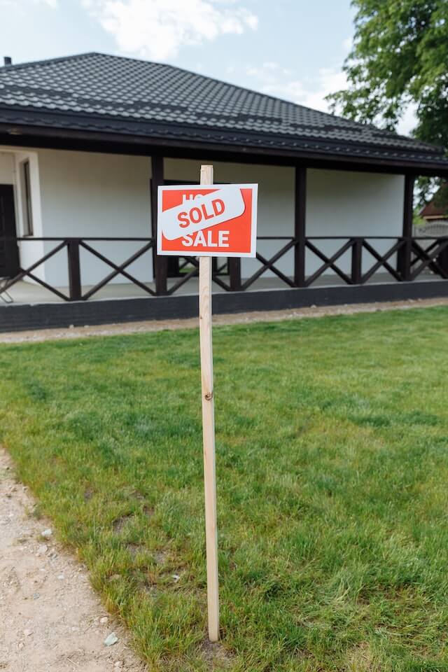 real estate sold sign